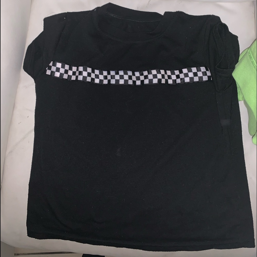 black shirt with checkered pattern